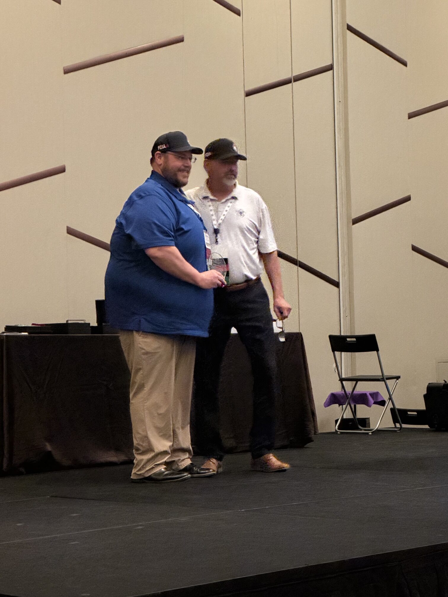 Adam Carter, Superior Insulation Director of Fire and Life Safety and Second Vice President of NFCA, receives the NFCA Achievement Award for Service to the Passive Fire Protection Industry.